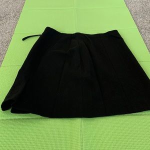 AnnTaylor black skirt with side detail.